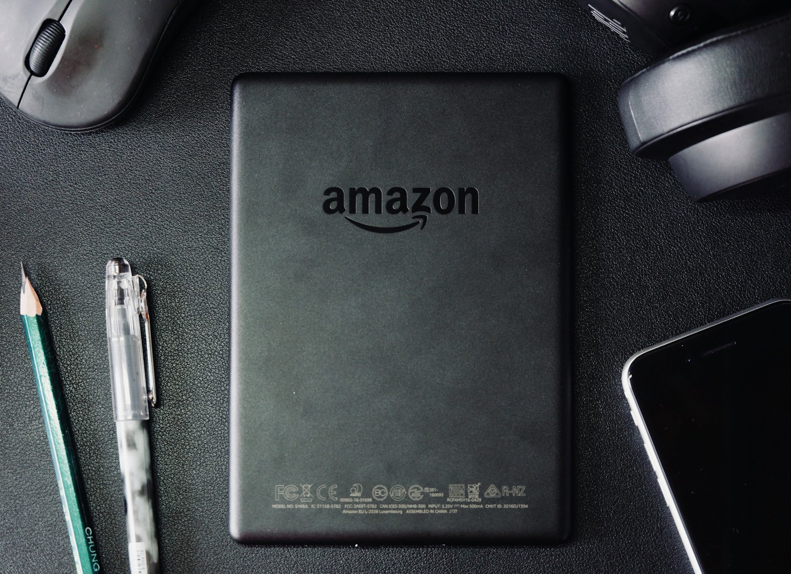 black tablet, amazon logo